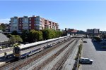  Amtrak Capitol Corridor Train # 534, enroute from Oakland Jack London Square to Sacramento, arrives at Emeryville Station with California Cab Car # 8312 in the lead